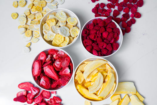 image of a variety of fruits, mangos, peaches, pineapple, apple, berries